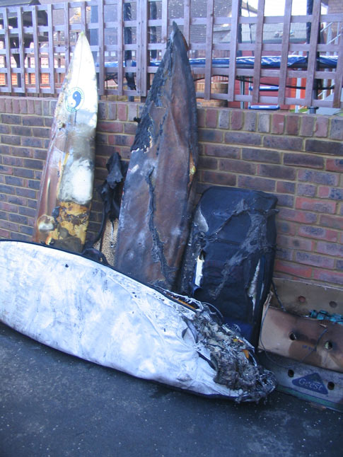 house fire burns surfboards